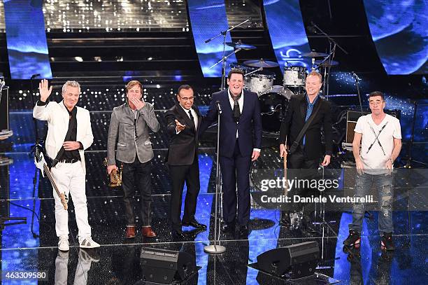 Carlo Conti and Spandau Ballet attend the thirth night of 65th Festival di Sanremo on February 12, 2015 in Sanremo, Italy.