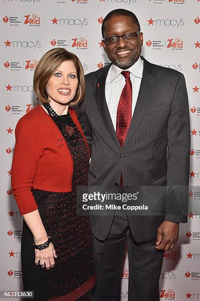 Nancy Brown of the American Heart Association and Gary Gibbons attend the Go Red For Women Red Dress Collection 2015 presented by Macy's fashion show...