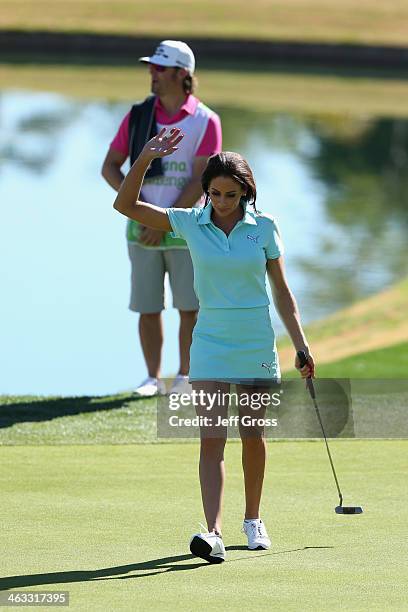 Holly Sonders acknowledges the gallery on the eighth hole of the Jack Nicklaus Private Course at PGA West during the second round of the Humana...