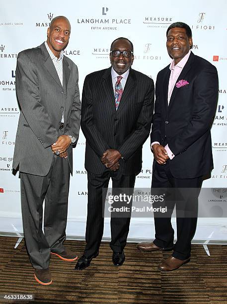 Former NBA players Jerome Williams, Earl "the Pearl" Monroe and Larry Johnson pose for a photo at the Party with the Pros at Langham Place New York...