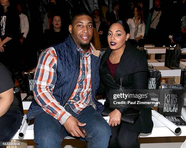 Devon Still and guest front row at Nike/Levi's Kids Rock! during Mercedes-Benz Fashion Week Fall 2015 at The Salon at Lincoln Center on February 12,...