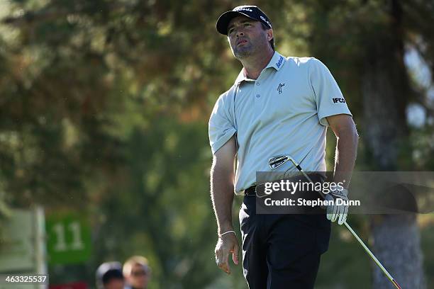 Ryan Palmer hits a tee shot at the eleventh hole of La Quinta Country Club Course during the second round of the Humana Challenge in partnership with...