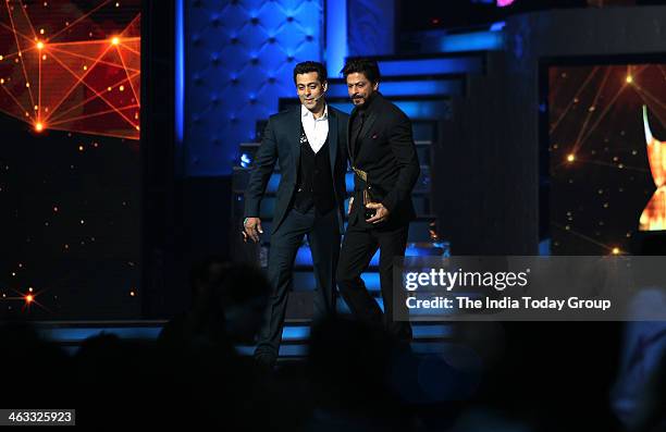 Bollywood actor Salman Khan and Shah Rukh Khan at the stage of Star Guild Awards in Mumbai.