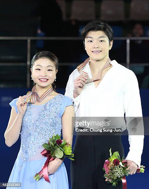 Third place winner Maia Shibutani and Alex Shibutani of United States pose on the podium after the medals ceremony of the Ice Dance on day two of the...