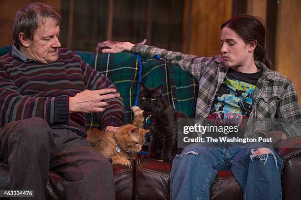 Mark Lee Adams playing Donny in "The Lieutenant of Inishmore" left, takes a break with Chris Dinolfo, playing Davey and the cats, OJ and Moose during...