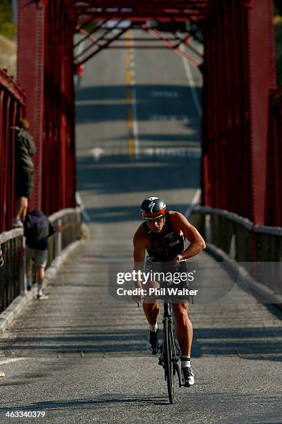 Dylan McNeice of New Zealand on the bike leg during the Challenge Wanaka on January 18, 2014 in Wanaka, New Zealand.