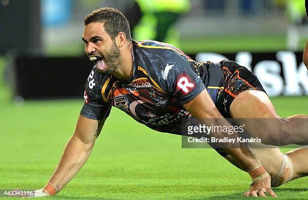 Greg Inglis of the Indigenous All Stars celebrates after scoring a try during the NRL pre-season match between the Indigenous All Stars and the NRL...