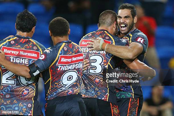 Greg Inglis of the Indigenous All Stars celebrates a try during the NRL pre-season match between the Indigenous All Stars and the NRL All Stars at...