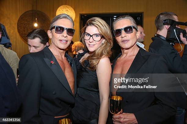 The Botox Boys Arnold and Oskar Wess and Miriam Geiregger attend the Champagne And Oyster Reception in Hotel Le Meridien on February 12, 2015 in...