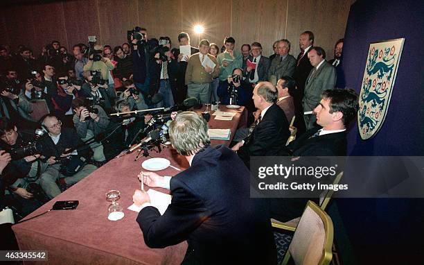 Manchester United player Eric Cantona and manager Alex Ferguson pictured at a media conference after an FA disciplinary hearing after Cantona was...