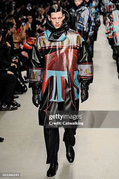 Model walks the runway at the Juun.J Autumn Winter 2014 fashion show during Paris Menswear Fashion Week on January 17, 2014 in Paris, France.