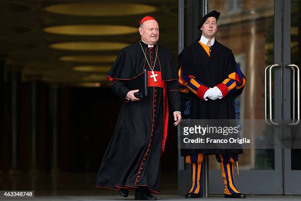 Cardinal Gianfranco Ravasi leaves the Synod Hall at the end of the Extraordinary Consistory for the creation of new cardinals on February 13, 2015 in...