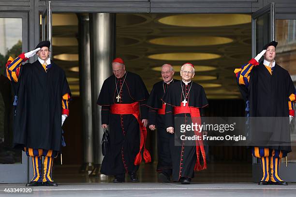 Archbishop of Vienna cardinal Christoph Schonborn and Archbishop of New York Cardinal Timothy Dolan leave the Synod Hall at the end of the...