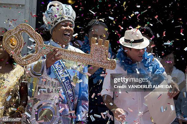 Carnival King Momo, Wilson Dias da Costa Neto receives the keys to the city from from Rio's mayor Eduardo Paes during the official launching of the...