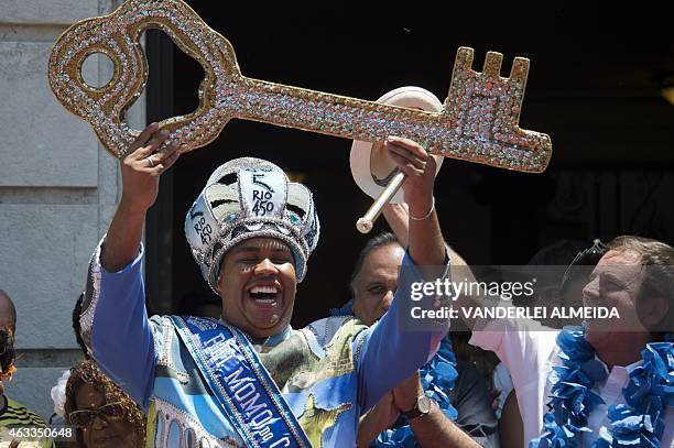Carnival King Momo, Wilson Dias da Costa Neto receives the keys to the city from from Rio's mayor Eduardo Paes during the official launching of the...