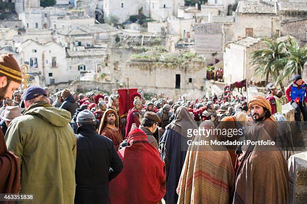 Extras in stage costume acting on the set of the film Ben Hur being shot in Matera on February 3,2015.