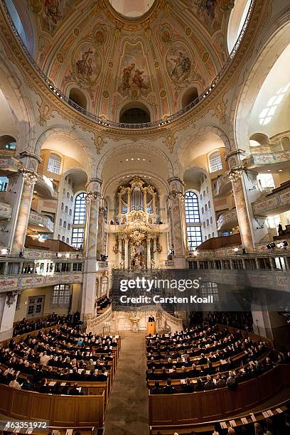 Members of the congregation attend a ceremony in Frauenkirche during the commemoration of the 70th anniversary of the Allied firebombing of Dresden...