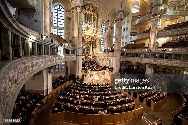 Members of the congregation attend a ceremony in Frauenkirche during the commemoration of the 70th anniversary of the Allied firebombing of Dresden...