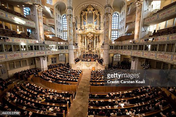 Members of the congregation attend a ceremony in Frauenkirche during the commemoration of the 70th anniversary of the Allied firebombing of Dresden...