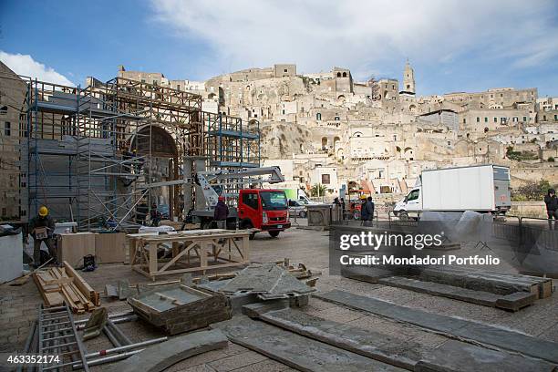 Workers placing a scaffolding on the set of the film Ben Hur being shot in Matera on January 23, 2015.