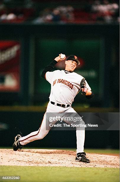 Julian Tavarez of the San Francisco Giants pitches against the St. Louis Cardinals at Busch Stadium on April 29, 1997 in St. Louis, Missouri.