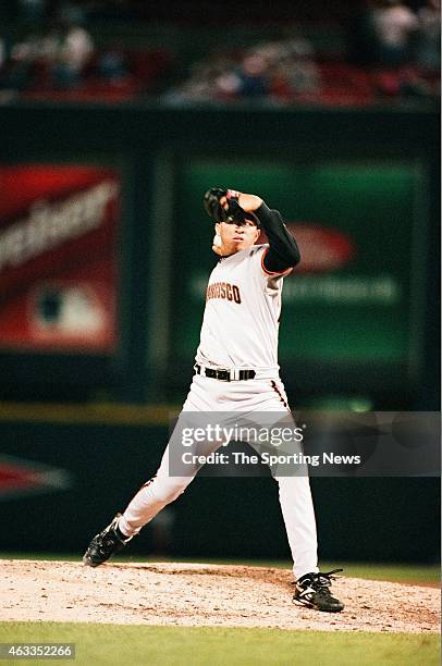 Julian Tavarez of the San Francisco Giants pitches against the St. Louis Cardinals at Busch Stadium on April 29, 1997 in St. Louis, Missouri.