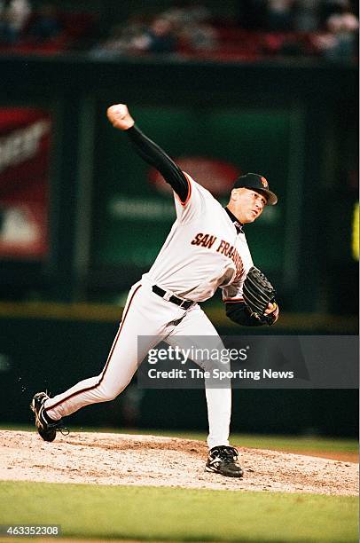 Julian Tavarez of the San Francisco Giants pitches against the St. Louis Cardinals at Busch Stadium on April 29, 1997 in St. Louis, Missouri.