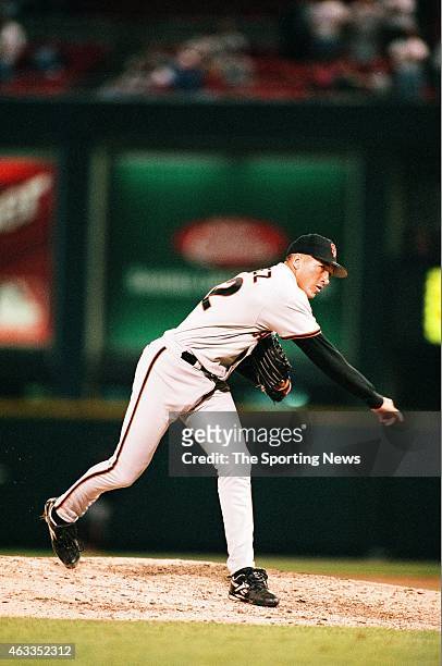 Julian Tavarez of the San Francisco Giants pitches against the St. Louis Cardinals at Busch Stadium on April 29, 1997 in St. Louis, Missouri.