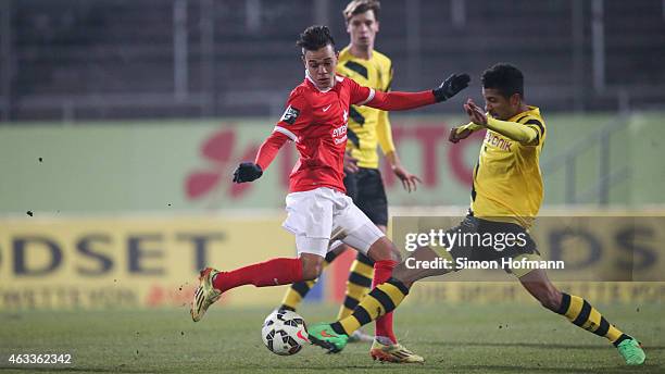 Devante Parker of Mainz is challenged by Jeremy Dudziak of Dortmund during the Third League match between 1. FSV Mainz 05 II and Borussia Dortmund II...