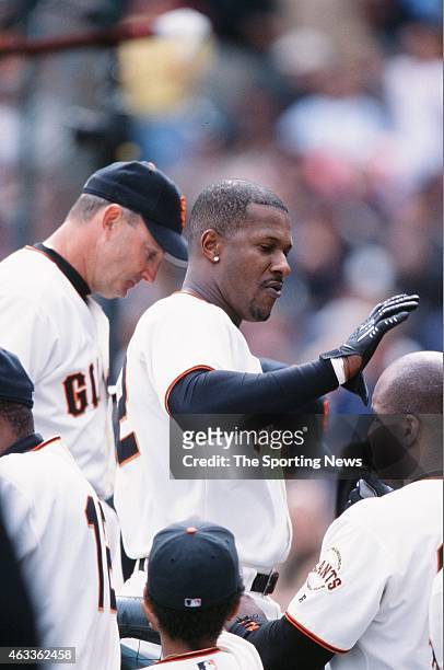 Eric Davis of the San Francisco Giants celebrates against the Los Angeles Dodgers at Pacific Bell Park on October 7, 2001 in San Francisco,...