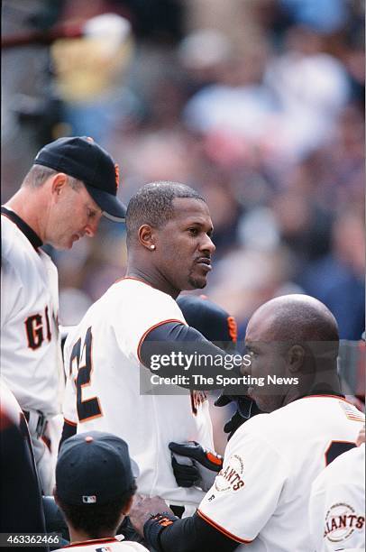 Eric Davis of the San Francisco Giants celebrates against the Los Angeles Dodgers at Pacific Bell Park on October 7, 2001 in San Francisco,...