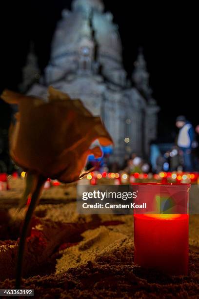 Candles light in front of the Frauenkirche to commemorate the 70th anniversary of the Allied firebombing of Dresden on February 13, 2015 in Dresden,...