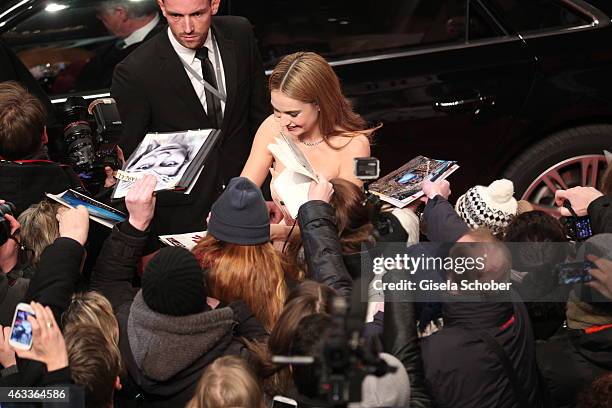 Lily James attends the 'Cinderella' premiere during the 65th Berlinale International Film Festival at Berlinale Palace on February 13, 2015 in...