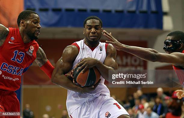 Joe Ragland, #1 of EA7 Emporio Armani Milan competes with Sonny Weems, #13 and Demetris Nichols, #8 of CSKA Moscow in action during the Turkish...