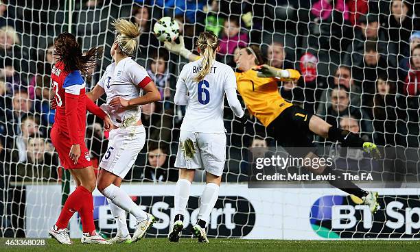 Alex Morgan of the USA looks on, as she scores a goal during a Women's International Friendly match between England and the USA at Stadium mk on...