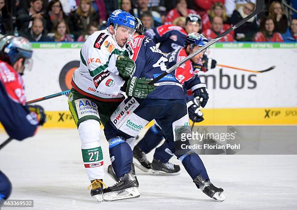 Ivan Ciernik of the Augsburger Panther and Henry Haase of the Eisbaeren Berlin during the game between Eisbaeren Berlin and Augsburger Panther on...