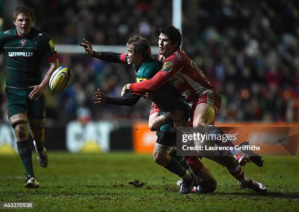 James Hook of Gloucester Rugy tackles Matthew Tait of Leicester during the Aviva Premiership match between Leicester Tigers and Gloucester Rugby at...