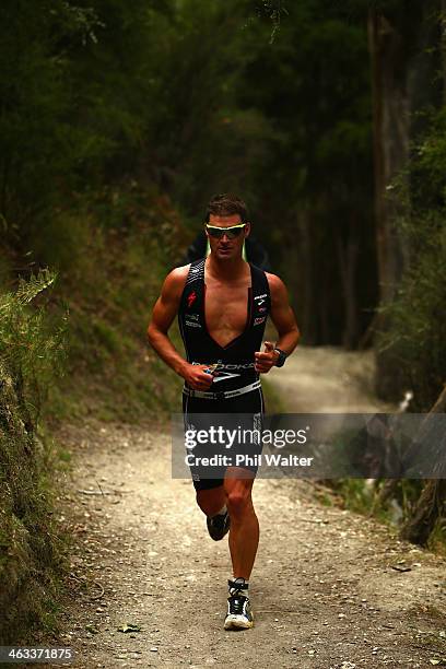 Dylan McNeice of New Zealand on the run leg during Challenge Wanaka on January 18, 2014 in Wanaka, New Zealand.