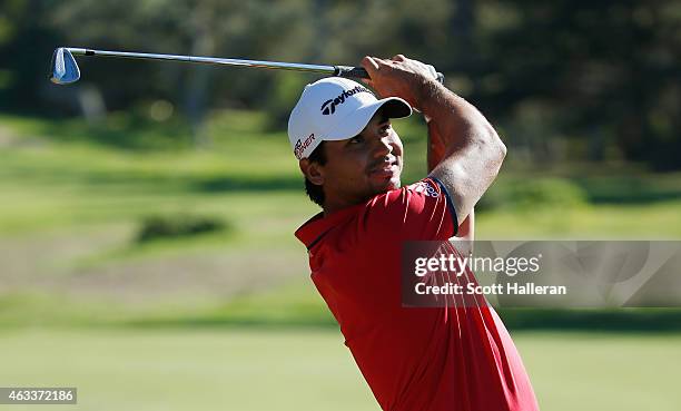 Jason Day of Australia hits his approach shot on the first hole during the second round of the AT&T Pebble Beach National Pro-Am at the Monterey...