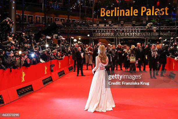 Lily James and Richard Madden attend the 'Cinderella' Premiere - AUDI At The 65th Berlinale International Film Festival on February 13, 2015 in...