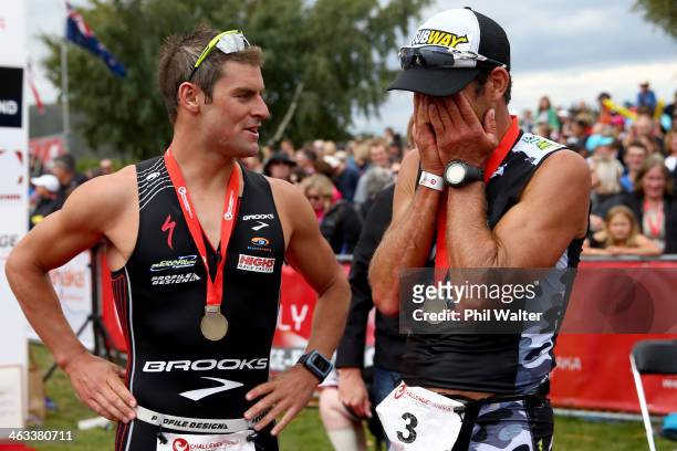 Dylan McNeice of New Zealand talks with Richard Ussher following the Challenge Wanaka on January 18, 2014 in Wanaka, New Zealand.