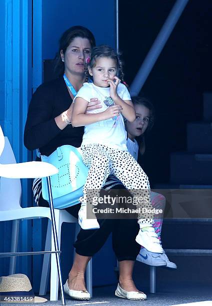 Mirka Federer, wife of Roger Federer of Switzerland and their children Charlene and Myla, watch him in his third round match against Teymuraz...