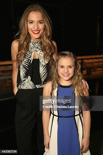 Lennon Stella and Maisy Stella attend the Nicole Miller fashion show during Mercedes-Benz Fashion Week Fall 2015 at The Salon at Lincoln Center on...