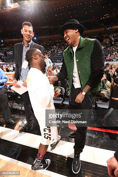 Kevin Hart of the East Team talks to Carmelo Anthony of the New York Knicks before the Sprint NBA All-Star Celebrity Game as part of 2015 All-Star...