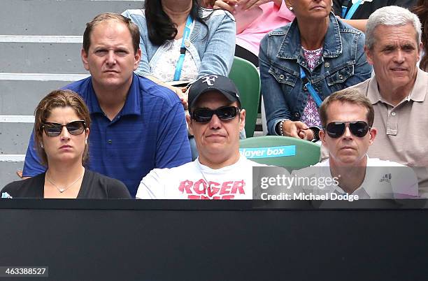 Mirka Federer, wife of Roger Federer of Switzerland and his coach Stefan Edberg watch him in his third round match against Teymuraz Gabashvili of...