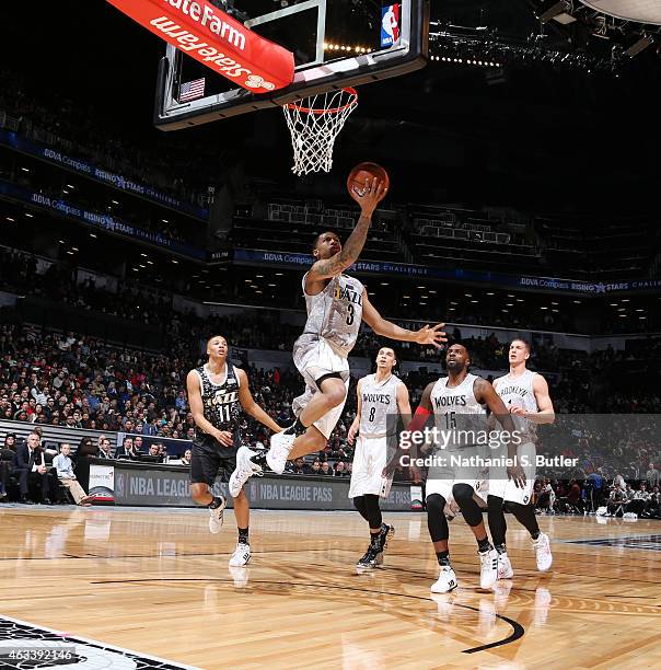 Trey Burke of the U.S. Team goes up to shoot during a game against the World Team during the BBVA Compass Rising Stars Challenge as part of 2015...