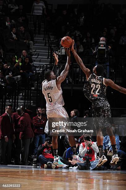 Giannis Antetokounmpo of the World team blocks a shot against Victor Oladipo of the USA team in the 2015 BBVA Rising Stars Challenge on February 13,...