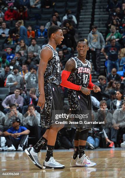 Andrew Wiggins Minnesota Timberwolves and Dennis Schroder Atlanta Hawks of the World Team look on at Barclays Center on February 13, 2015 in New...