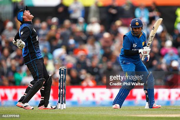 Luke Ronchi of New Zealand celebrates his catch of Mahela Jayawardene of Sri Lanka during the 2015 ICC Cricket World Cup match between Sri Lanka and...