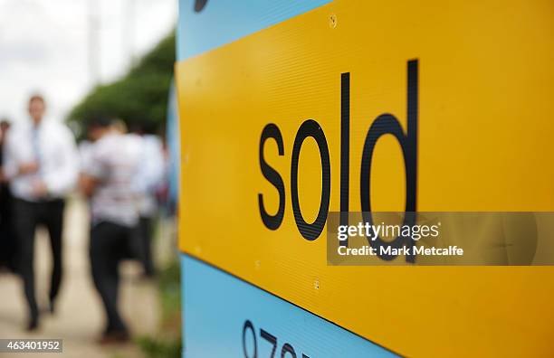 Sold sign stands on display after the home auction for a four-bedroom house at 230 Blacktown Road on February 14, 2015 in Blacktown, Australia. The...